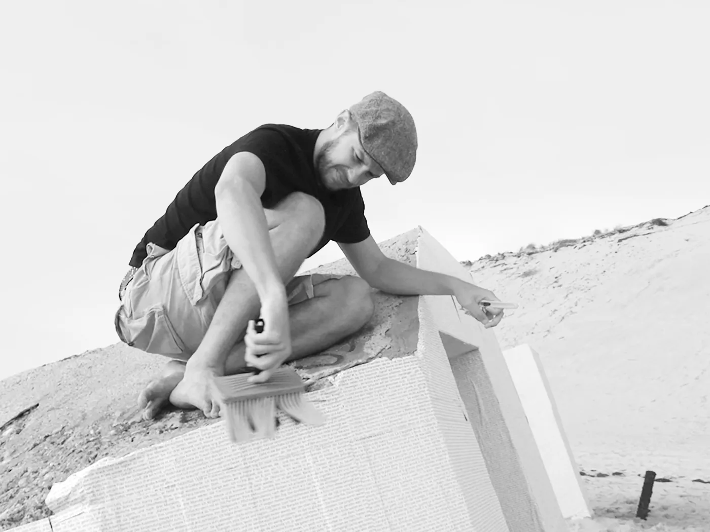 Se Souvenir - Pasting the billboards on the bunker walls.